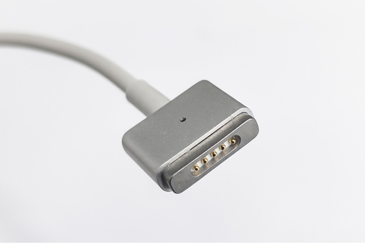 Close-up of the slim MagSafe 2 T-shape connector head
